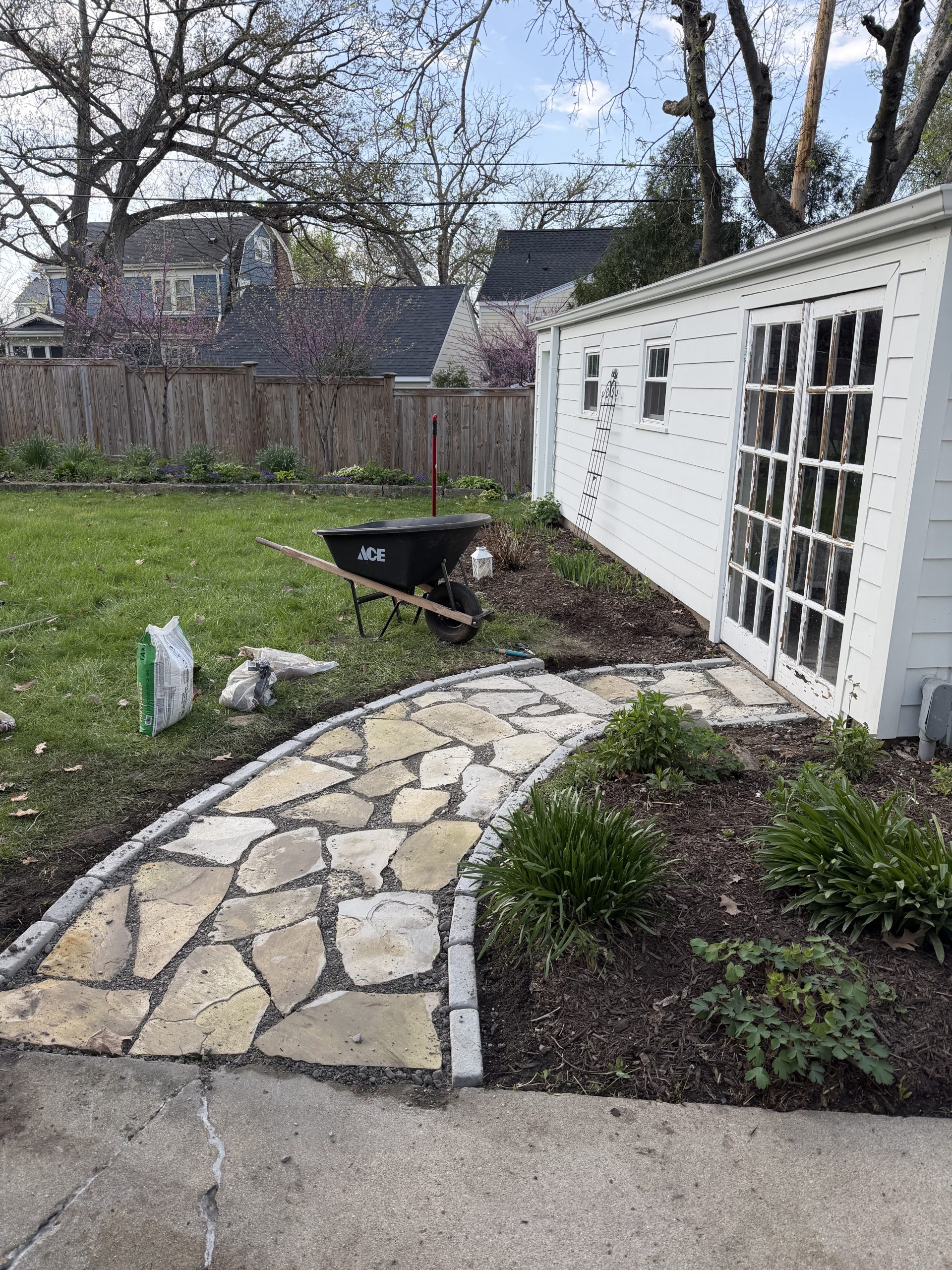 Completed paver walkway and path installed by OddJobs Services in Iowa